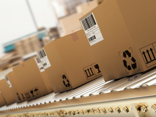 Sealed cartons moving along a production line conveyor of the kind checked by X-ray inspection systems